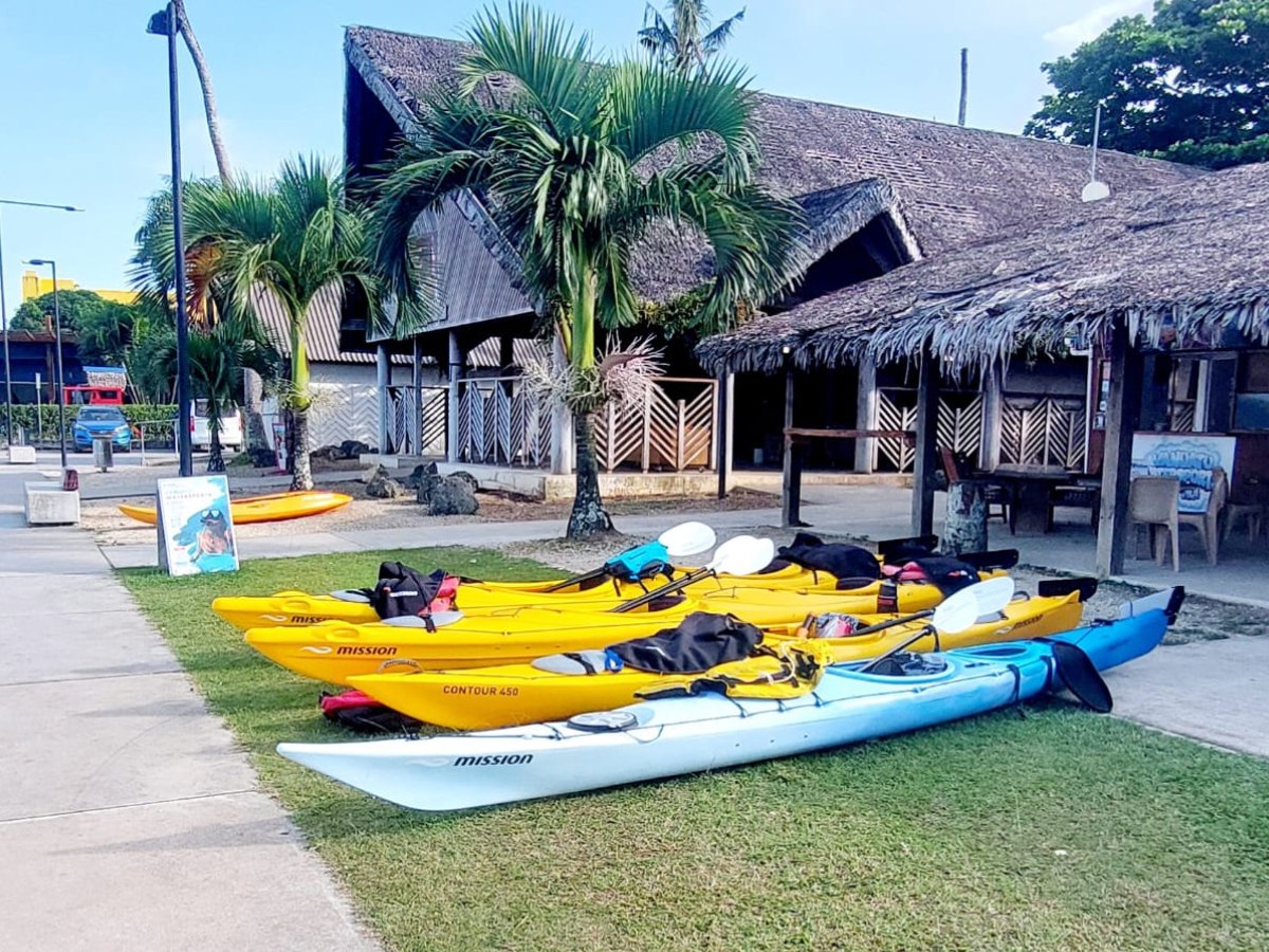 Yellow and blue Mission kayaks ready at the Watersports departure point