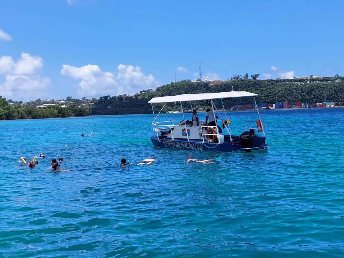 Reef Explorer boat with snorkellers at Iririki Island