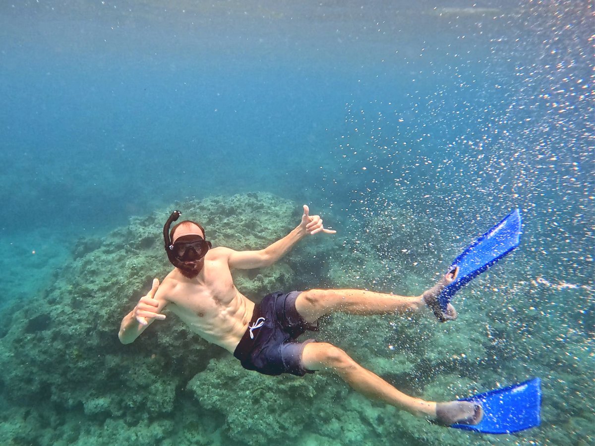Guest snorkelling over Paradise Cove reef