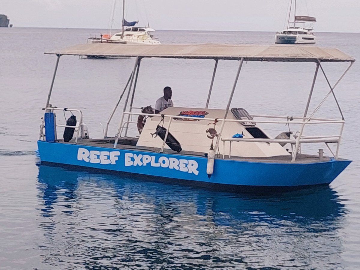 Reef Explorer boat with canopy on Port Vila harbour