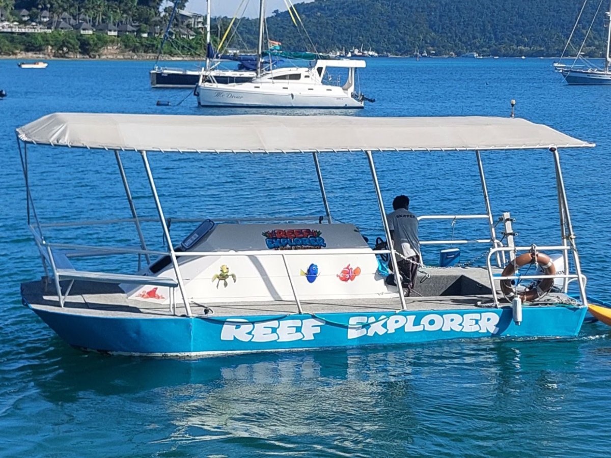 Reef Explorer semi-submersible boat on clear Port Vila water