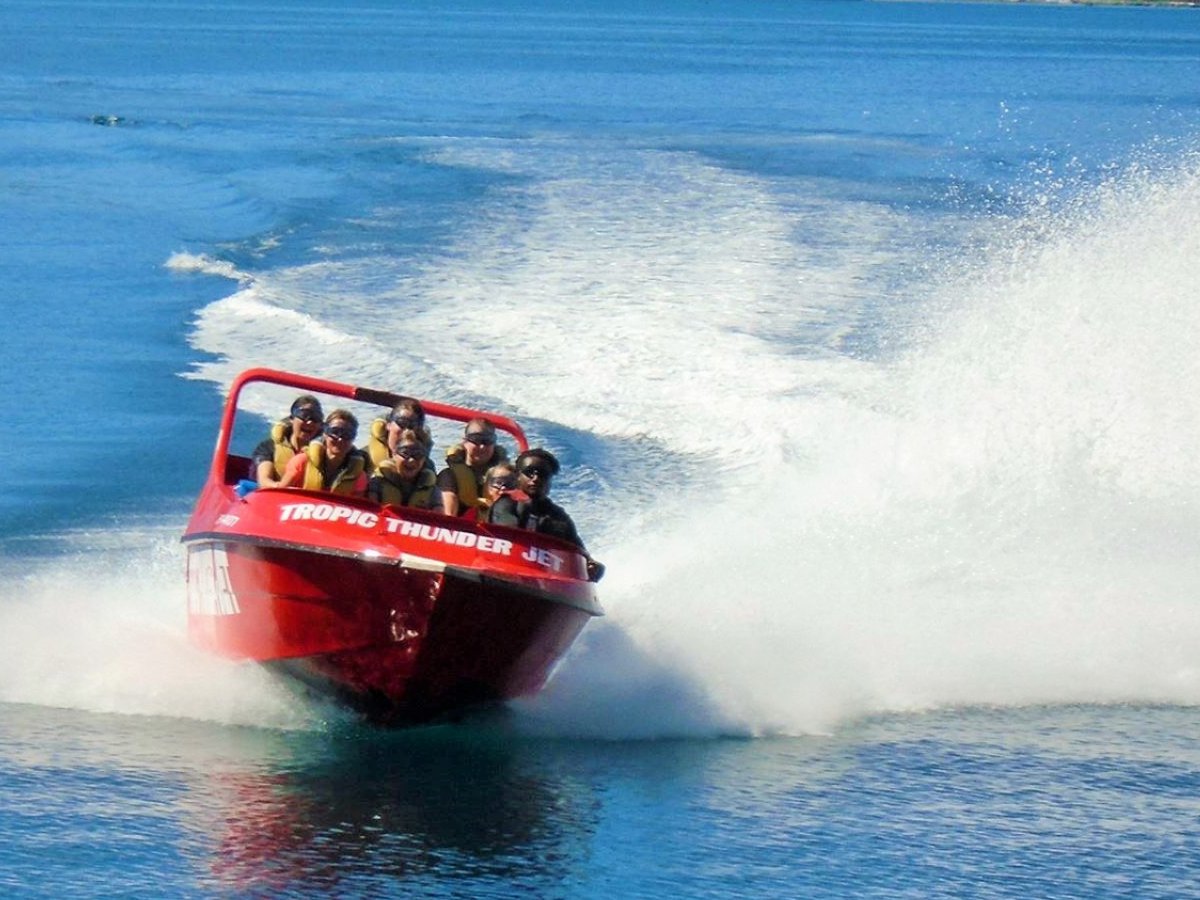 Tropic Thunder Jet high-speed ride with passengers in yellow life jackets