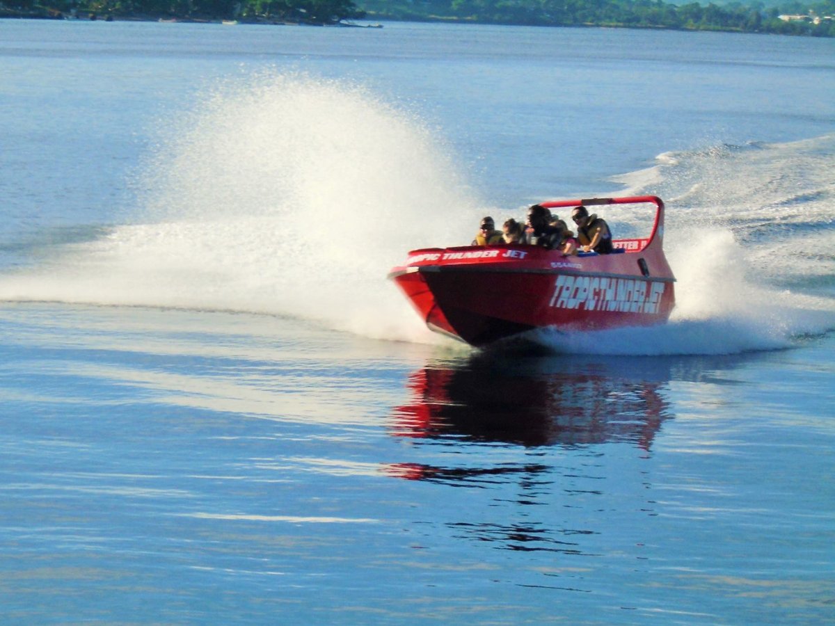 Tropic Thunder Jet spinning across Port Vila harbour with a wall of spray